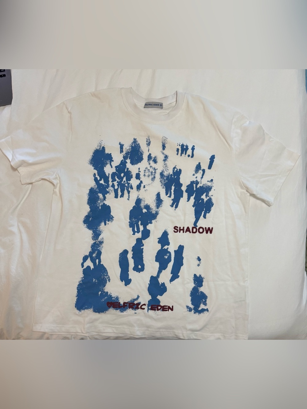 Aelfric Eden White Tee with Blue Graphic and Red Text